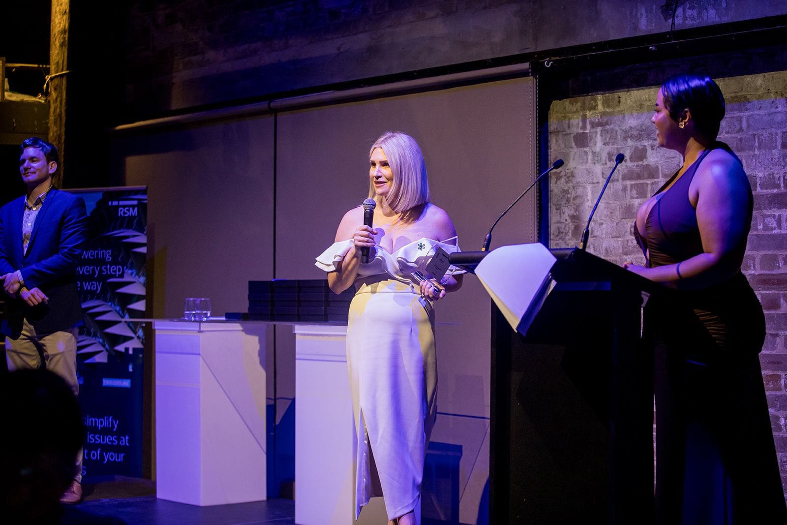 2025 Sydney Young Entrepreneur Awards Gala Dinner Winners accepting trophies on stage at the 2025 Sydney Young Entrepreneur Awards